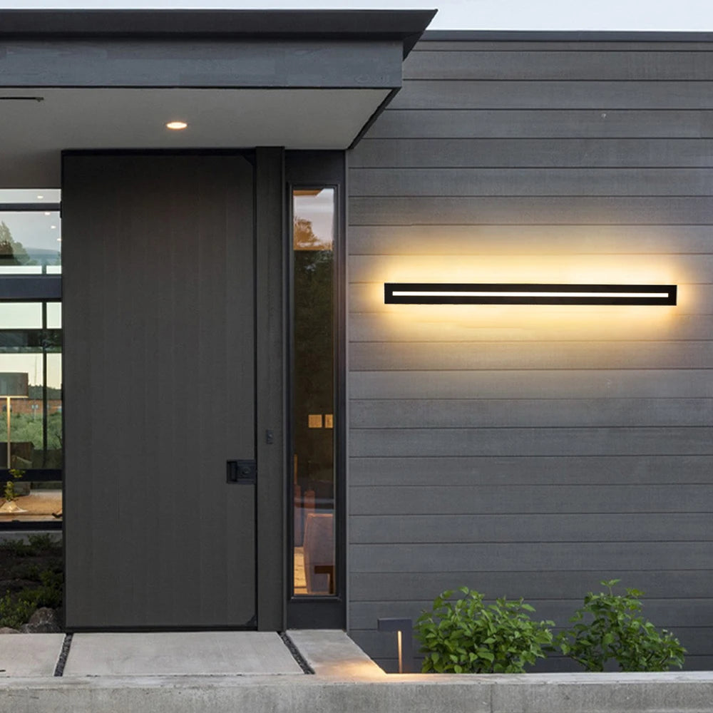 Modern Hollow Linear Outdoor LED Wall Sconce - Black Metal Exterior Light Fixture for Porch, Patio & Garage (Single/Pair)